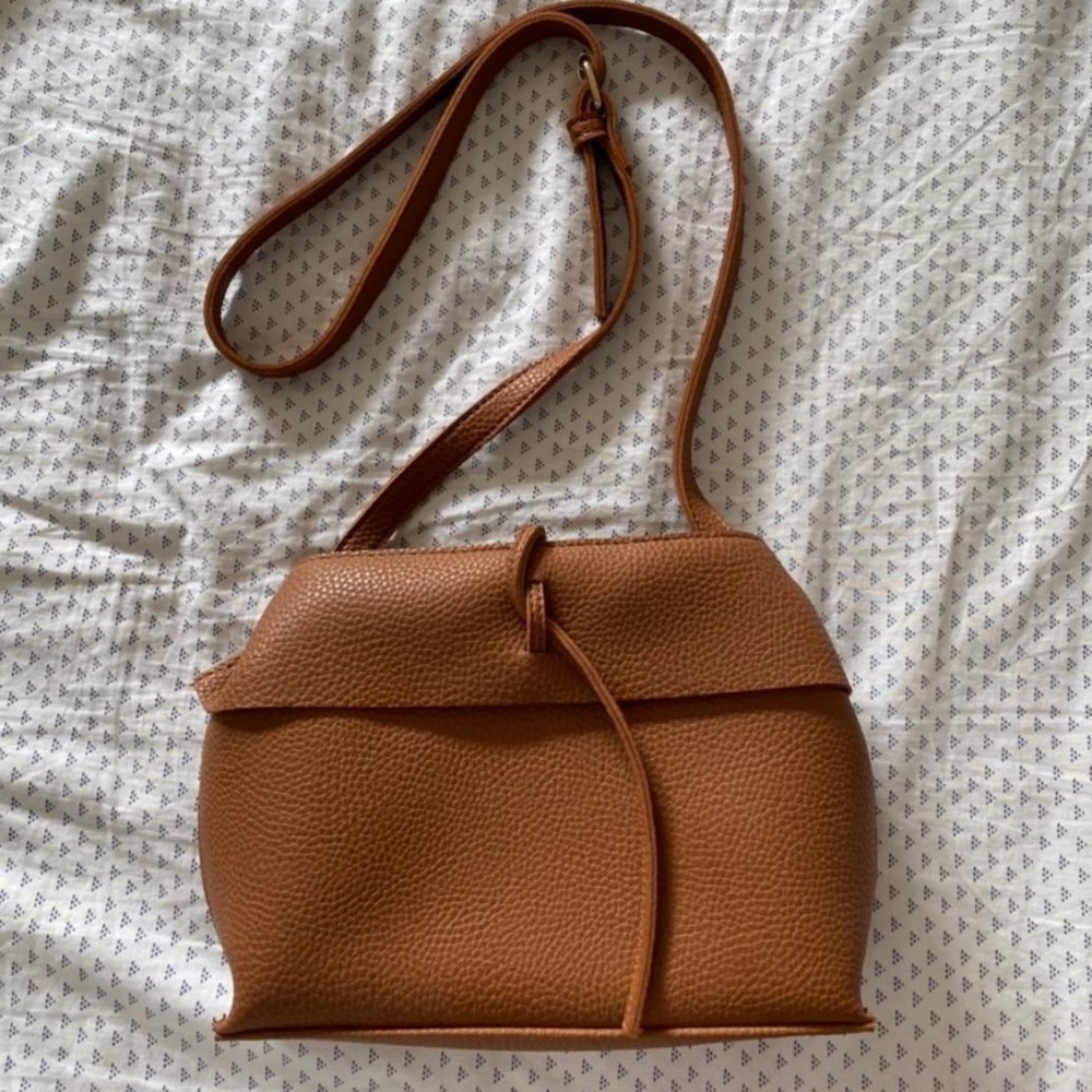 Brown purse with gold hardware